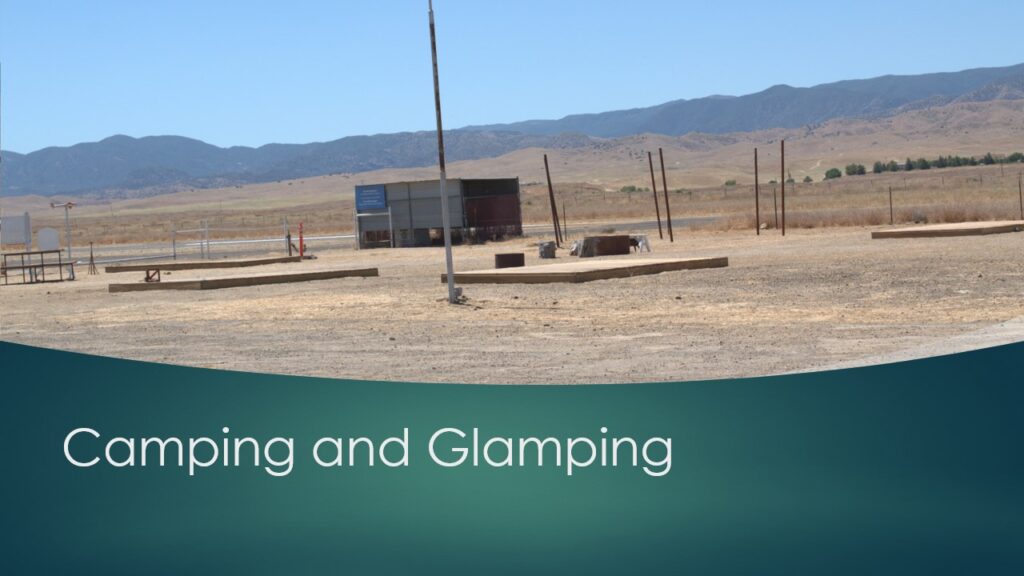 Vast dry salt flats with distant mountain range under a clear sky.