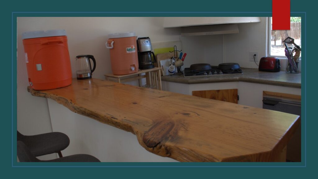 View of arid landscape and mountains from Furnace Creek Airport runway.