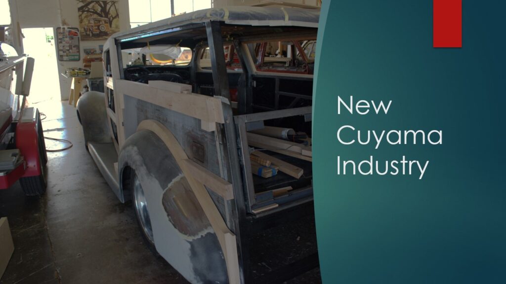 Small airplane parked inside a hangar.