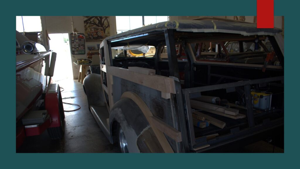 Small airplane parked inside a hangar.
