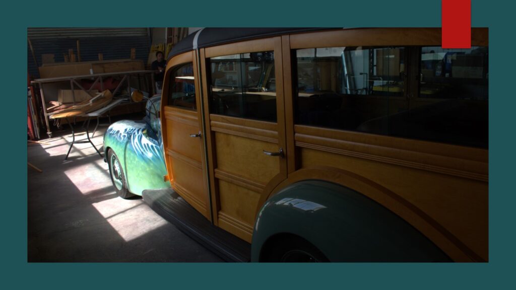 Small airplane parked inside a hangar.