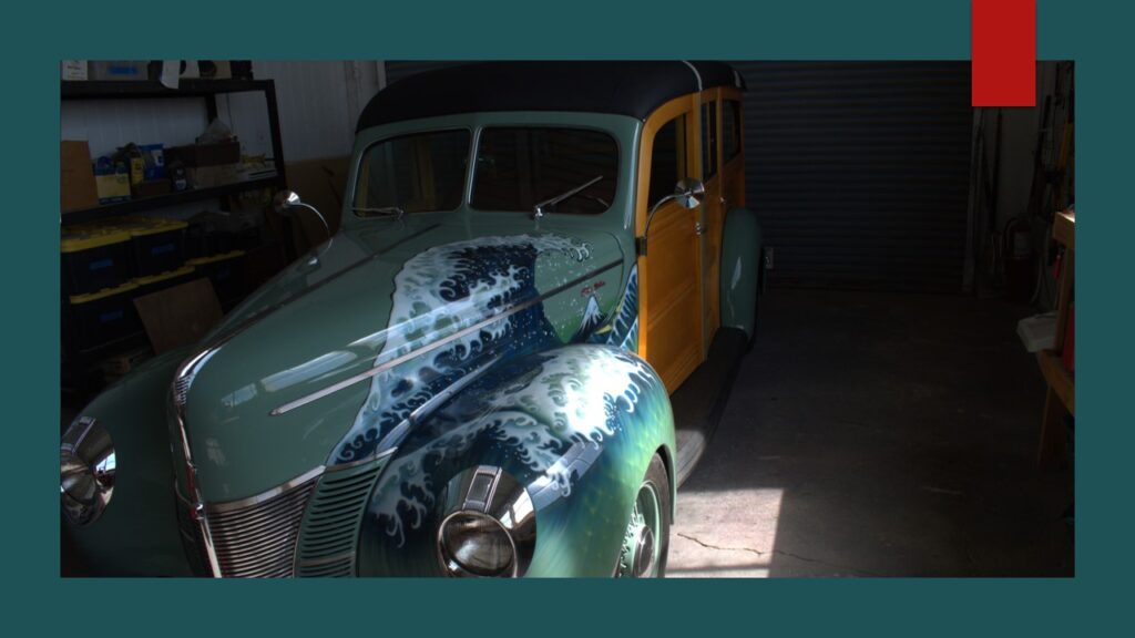 Man standing next to a small private airplane on a cloudy day.