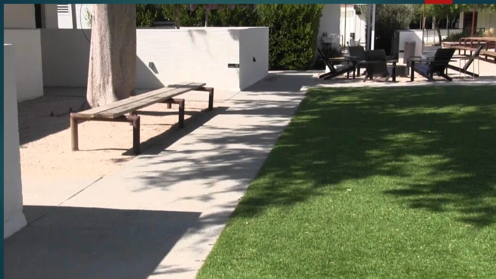 Confusing road signs at a busy intersection causing driver uncertainty.